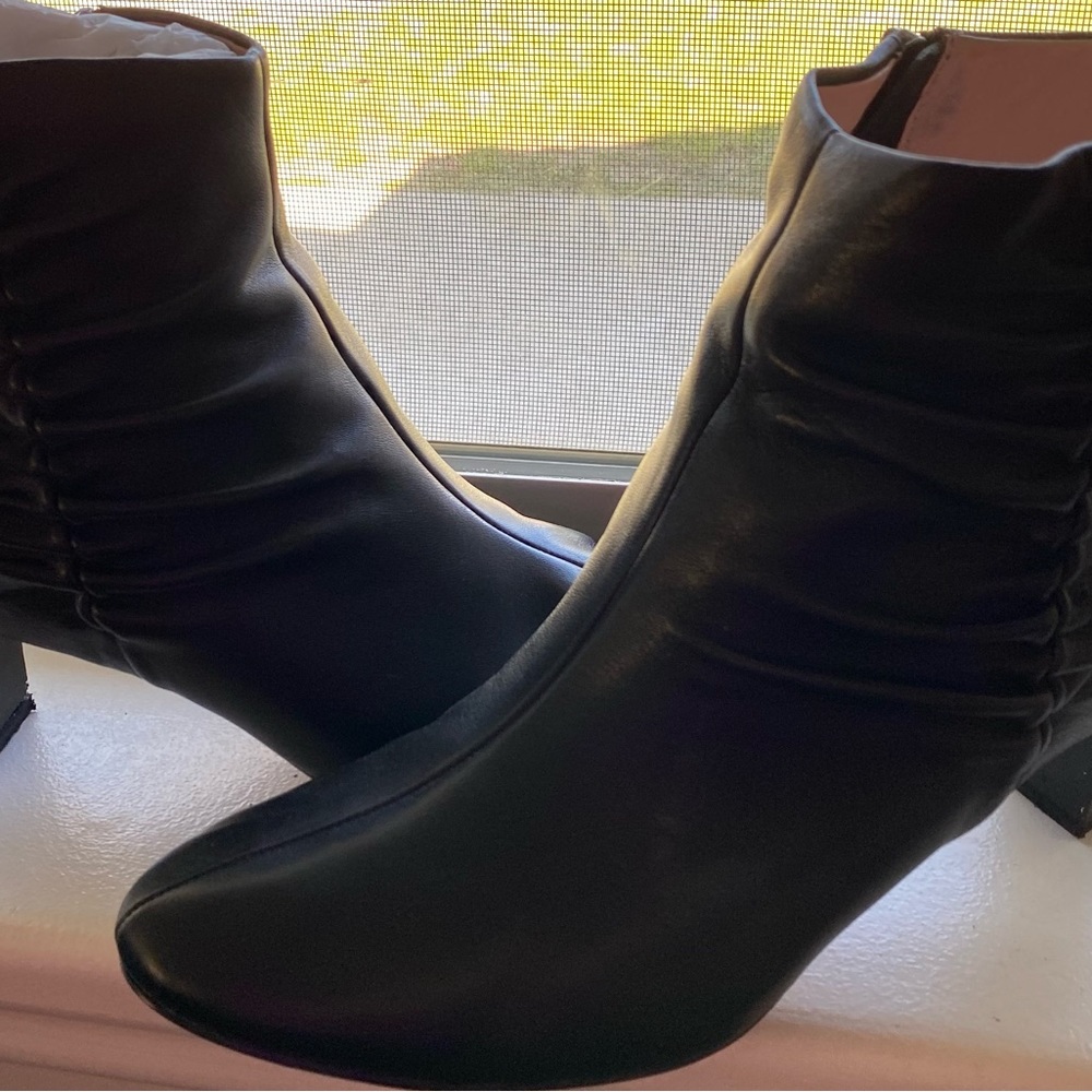 Black booties by Taryn Rose